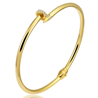 Bransoletka sztywna z cyrkoniami żółte złoto 585 modna kolekcja