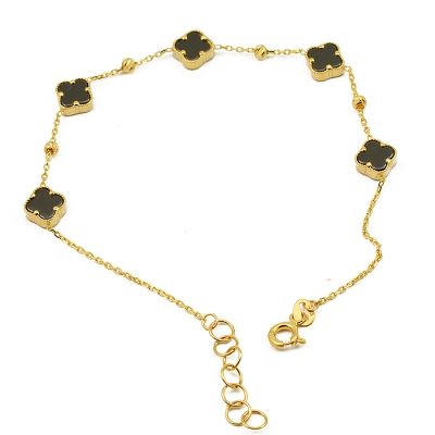 Złota bransoletka z czarnymi koniczynkami i diamentowanymi kulkami / pr.585