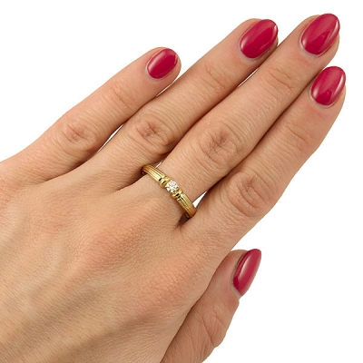 Złoty pierścionek z brylantem 0,10 ct / pr.585